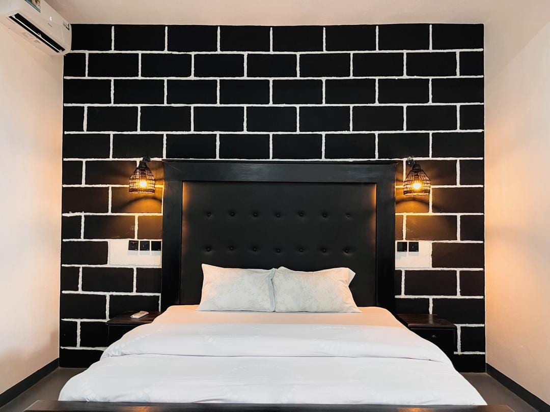 Njiro Legacy guest room with black feature wall